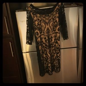 Gorgeous black lace over tan designer dress.