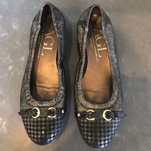 AGL black and gold flats with houndstooth toe cap.