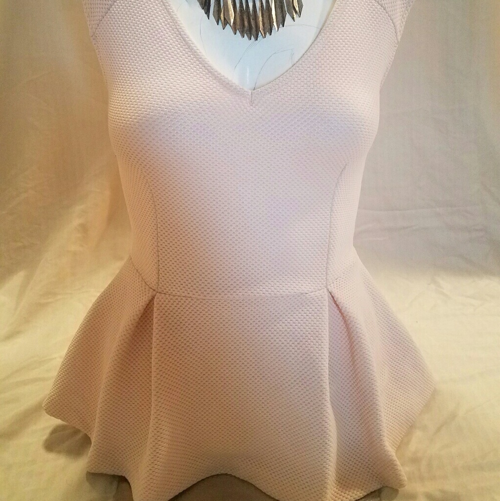 Pink peplum top