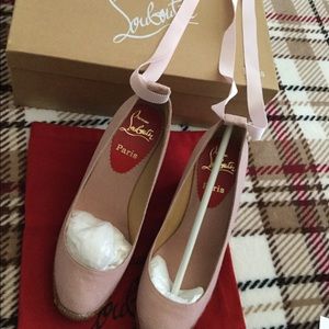 Christian Louboutin pink lace up wedge espadrille.