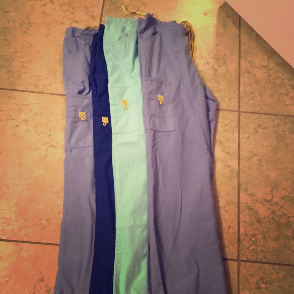 4 pair of Wonder Wink scrubs pants