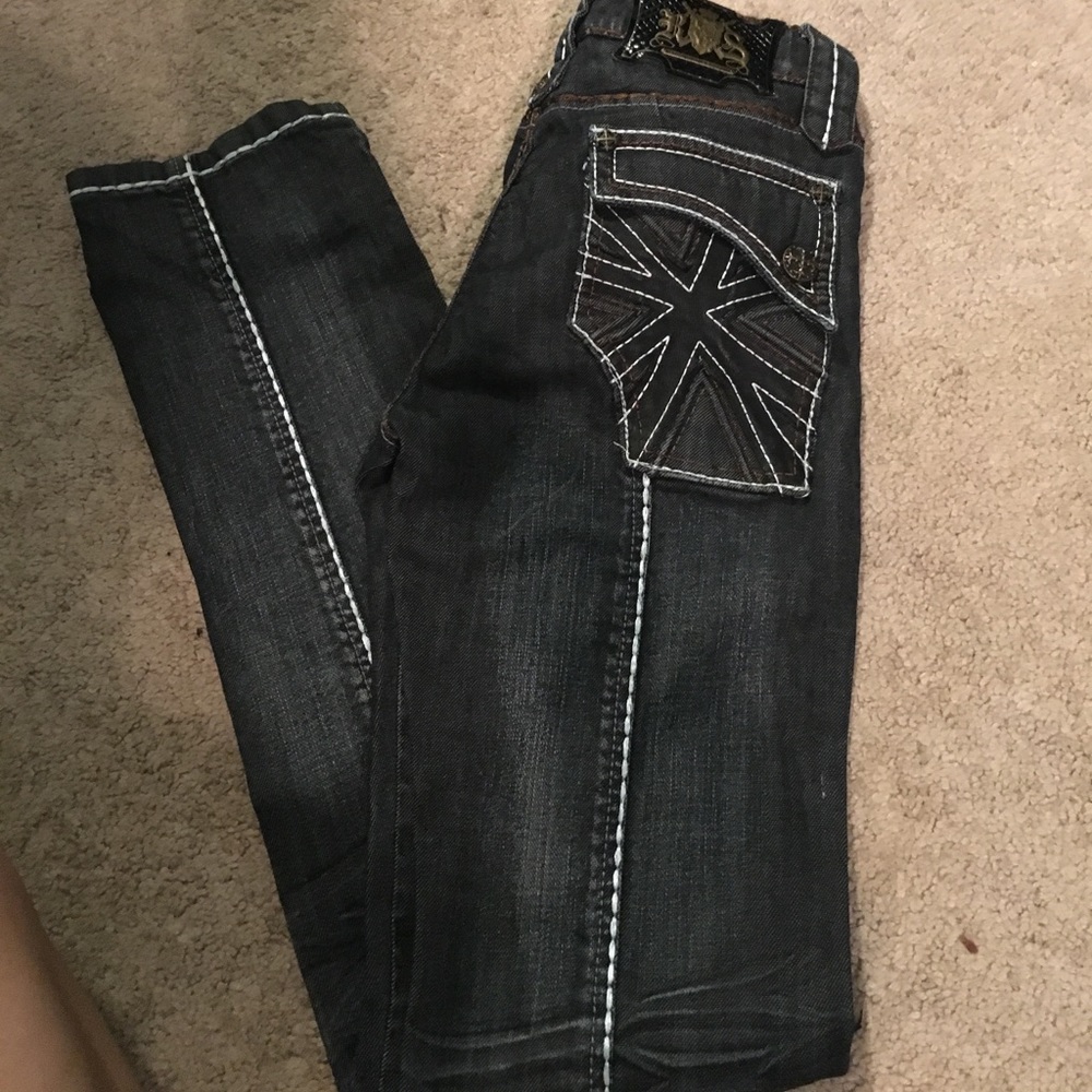 Dark wash skinny jeans from buckle