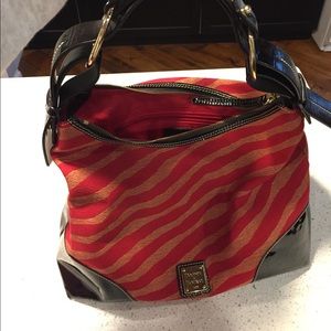 Black patent, red and gold zebra striped bag