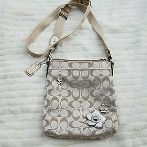 Coach crossboddy 9" long 7.5" wide.