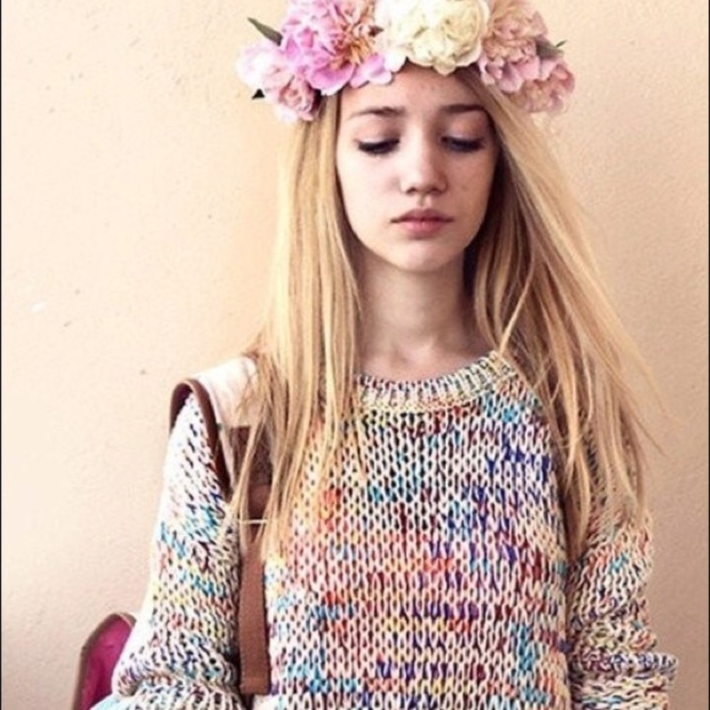 Rainbow trendy sweater. It's new.