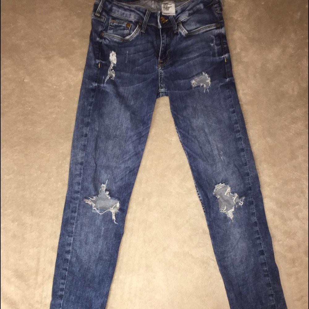 Super Skinny Distressed Jeans