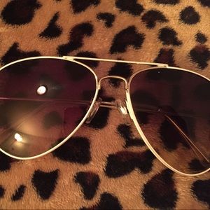Barley worn white and silver aviators