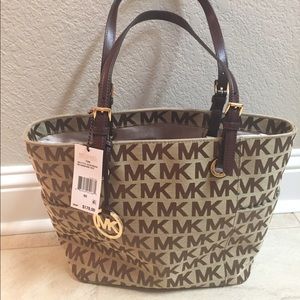 SOLD. Michael Kors Signature Tote