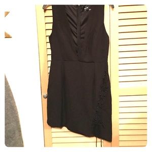 Low cut little black dress with side lace