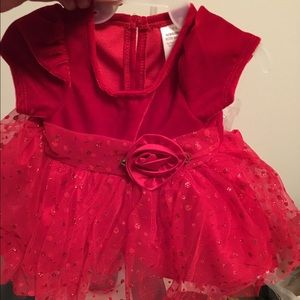 Pretty red dress for a newborn.