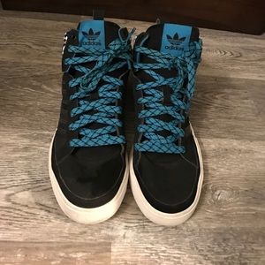 Blue high top adidas sneakers