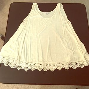 Cream colored tank top with knitted lace bottom