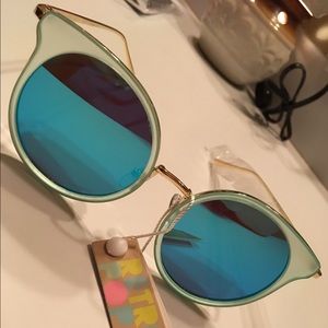 Mirrored cat eye sunglasses.
