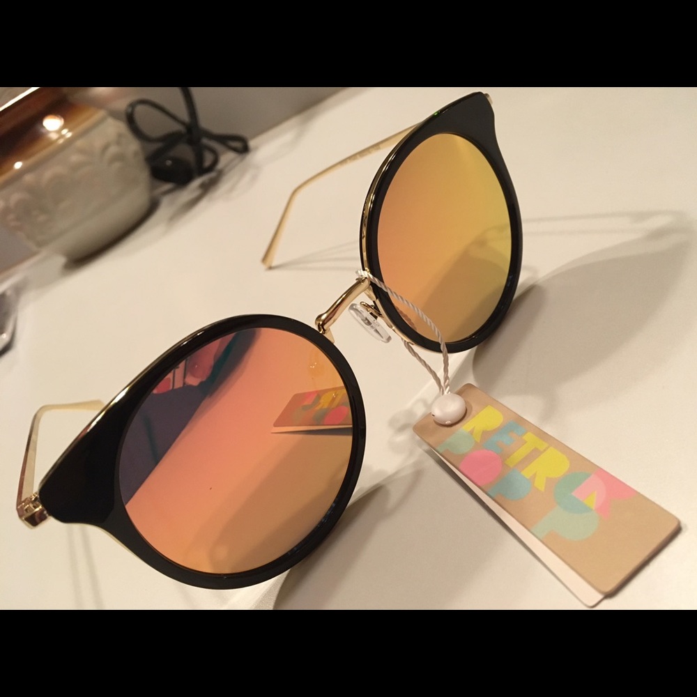 Mirrored cat eye sunglasses.