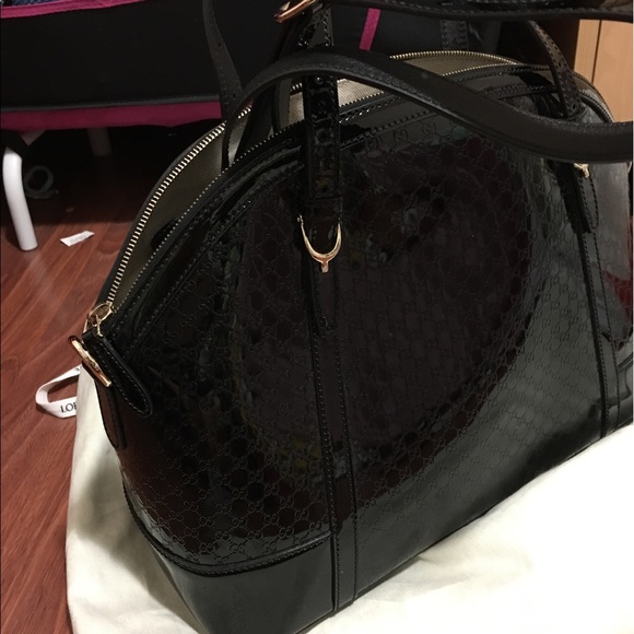 Gucci - Picture 1 of 3