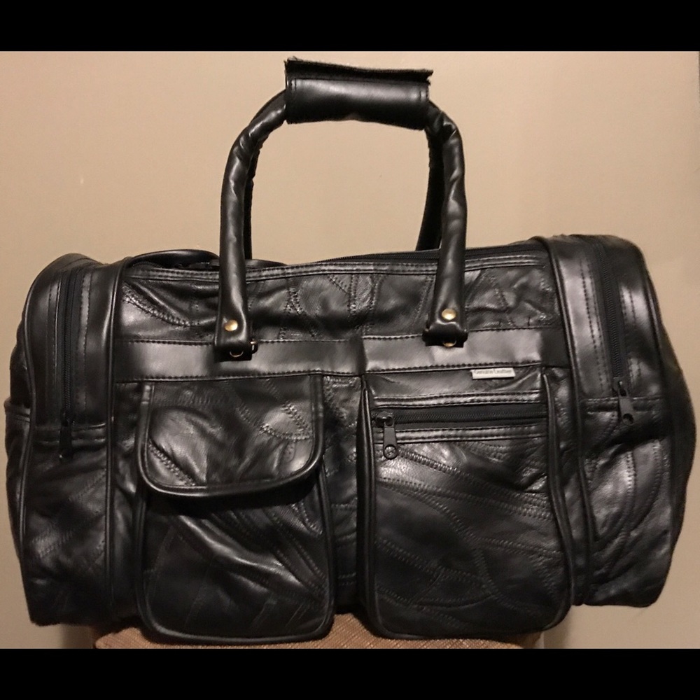 LEATHER DUFFLE BAG.