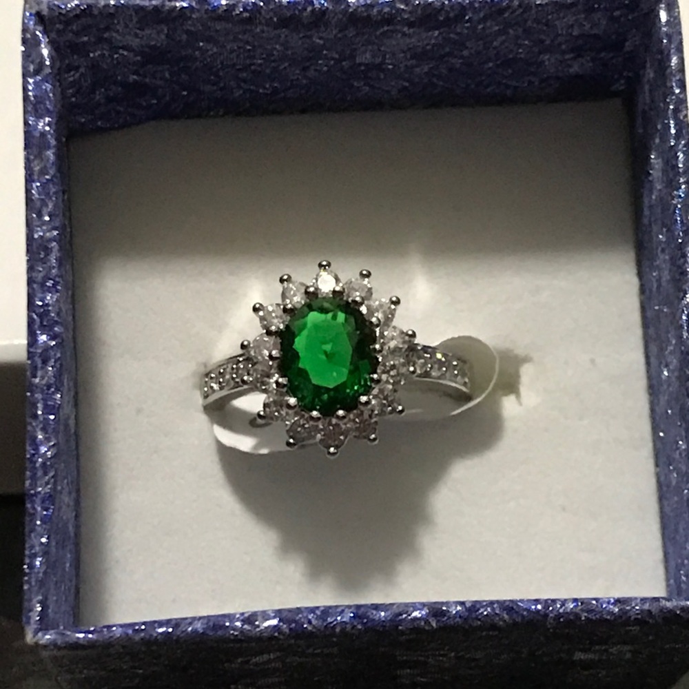 Emerald and cubic zirconia ring