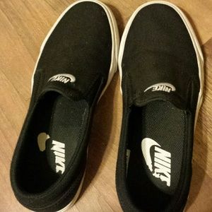 Black Nike Slip-Ons