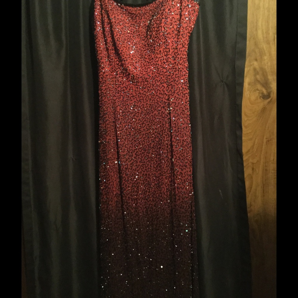 Evening gown, black with sequins . Worn once