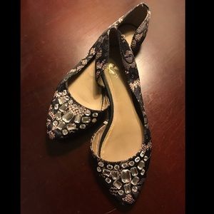 Report black and gold flats