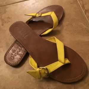 O'Neill brand yellow belted flip flops