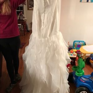 2 wedding dresses both hand made.