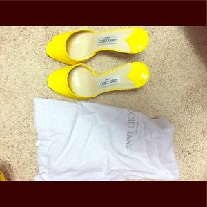 Yellow patent Jimmy Choo heels.