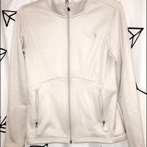 White furry zip up North Face jacket