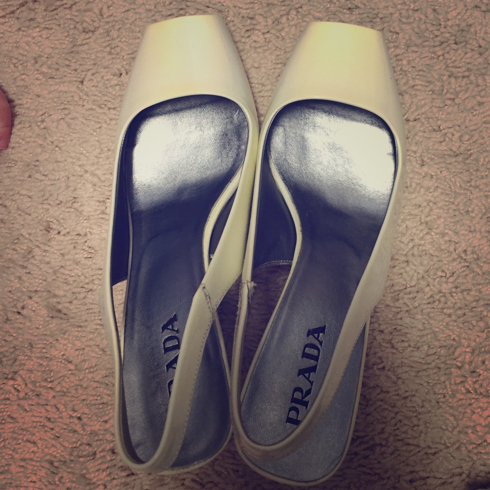 Cream/white patent peep toe Prada heels.