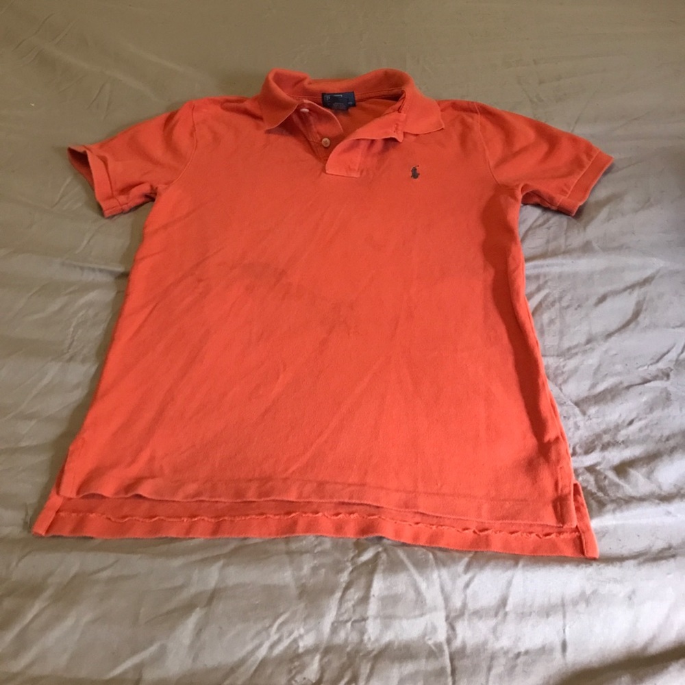 Boys' burnt orange polo.