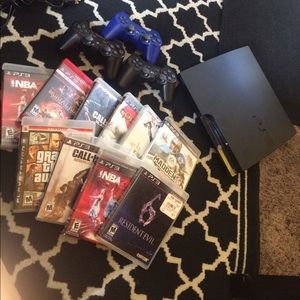 PS3 3 w/ 3 controllers and ten games