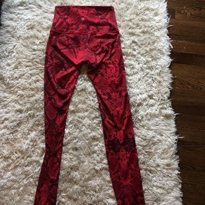Red snakeskin Lululemon high waist pants