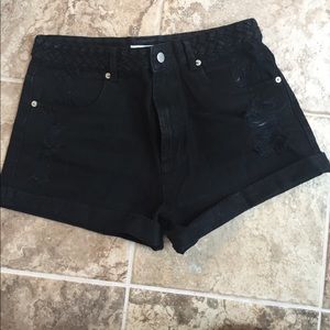 Black jean shorts from a boutique. New with tags!