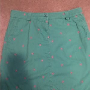 Knee length preppy skirt.