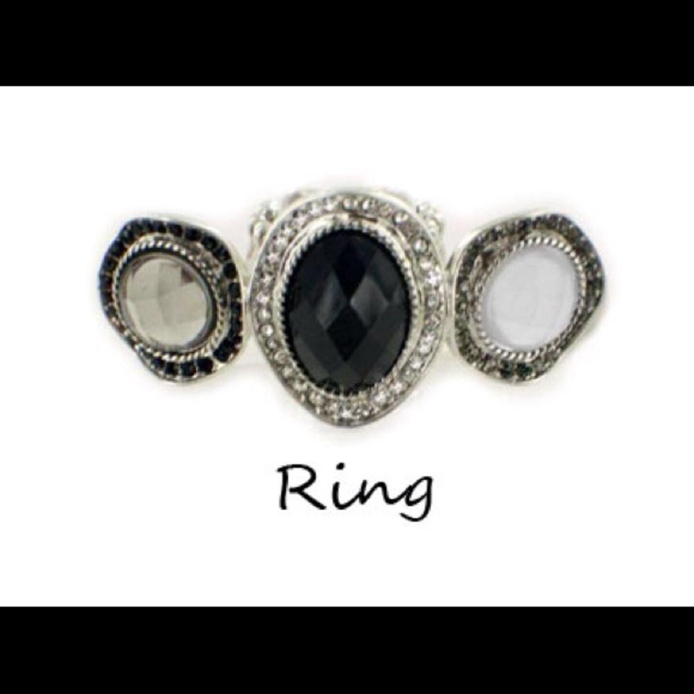 Jet black, clear, smokey grey and milky white ring