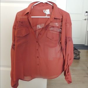 Sheer burnt orange blouse