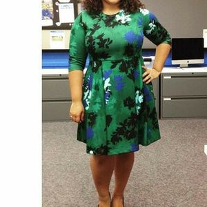 Green dress with floral pattern. Has pockets!!!
