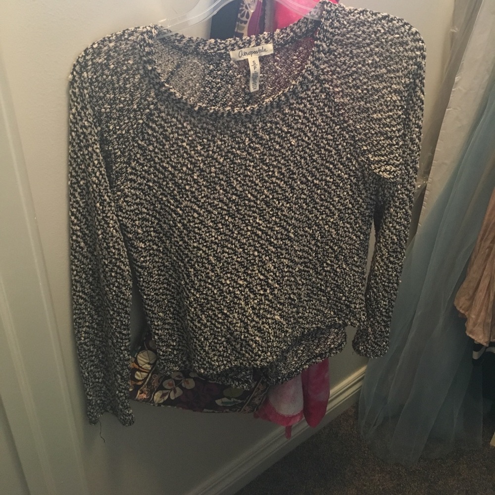 A black and white mesh long sleeve shirt