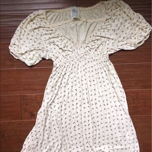 Cream dress with navy ribbon print