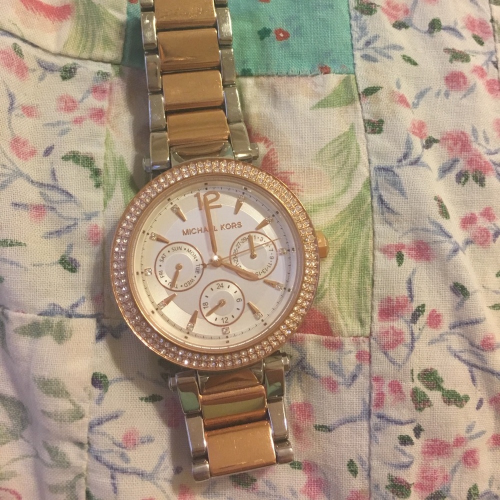 Michael Kors two toned big face watch.