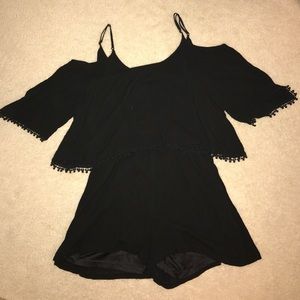 Black flowy romper with open shoulder