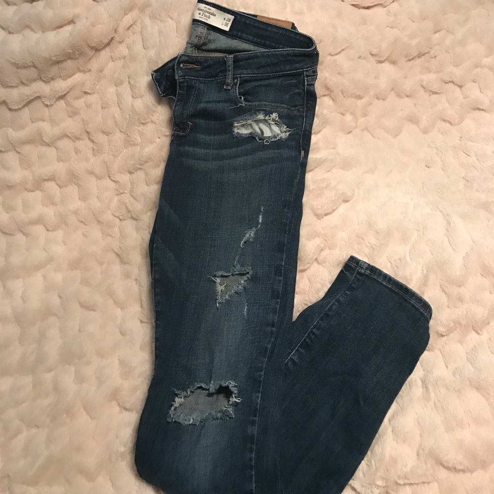 Slightly ripped Abercrombie jeans. Size 6L.