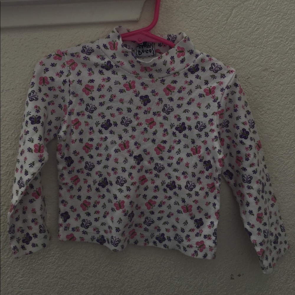 Girl's long sleeve top size 4 floral and butterfly