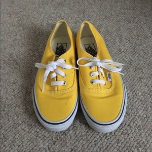 Yellow Vans shoes