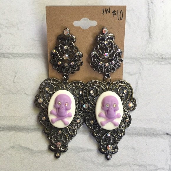 Jewelry - Fancy purple skull earrings