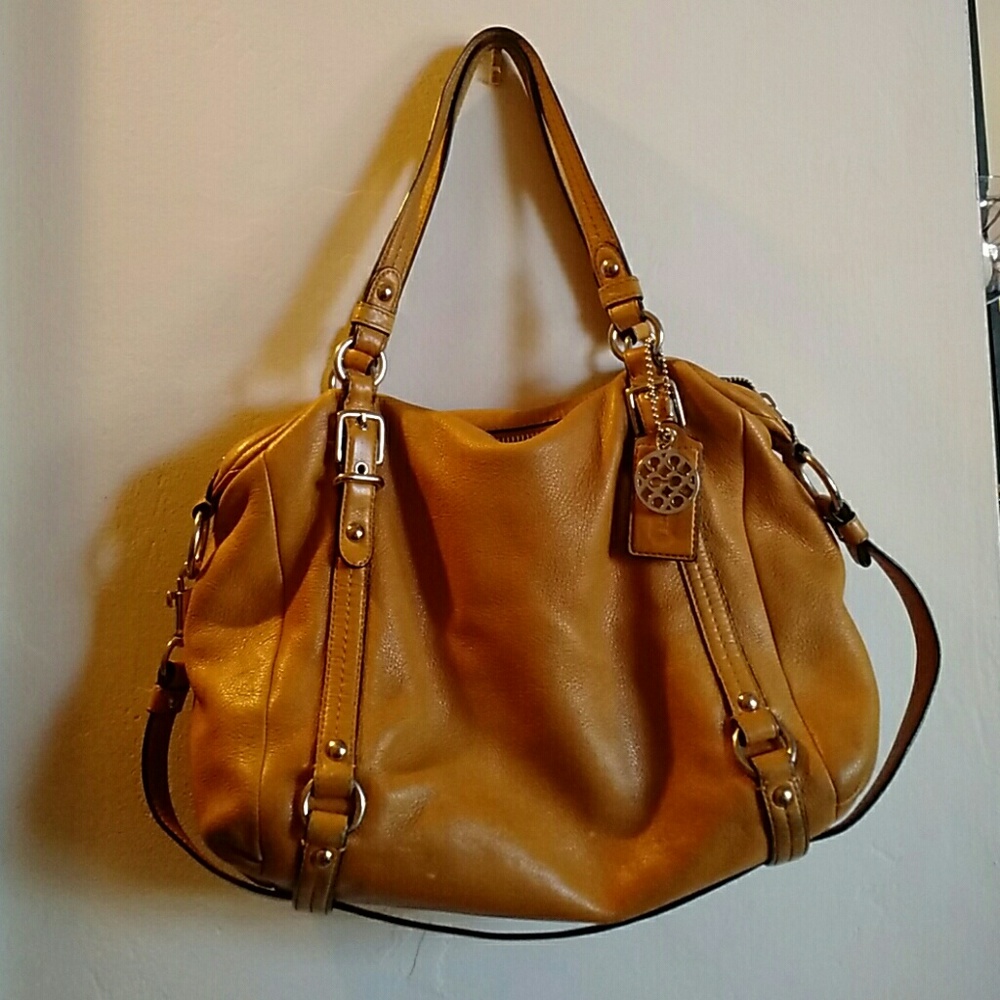 Well loved Mustard Pebble Leather Coach Purse?