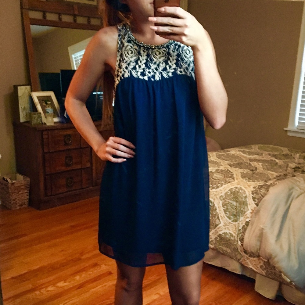 Navy flow dress with lace detailing