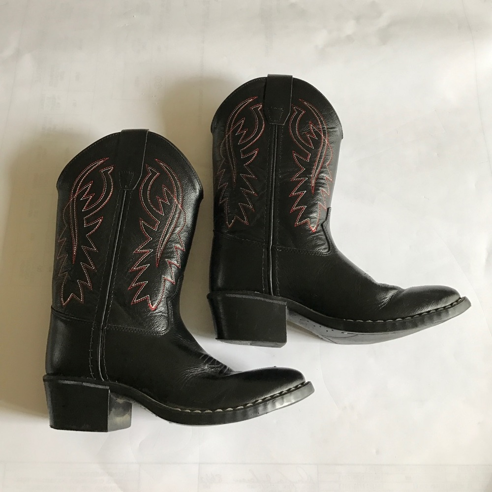 Boy or girl black leather cowboy boots.