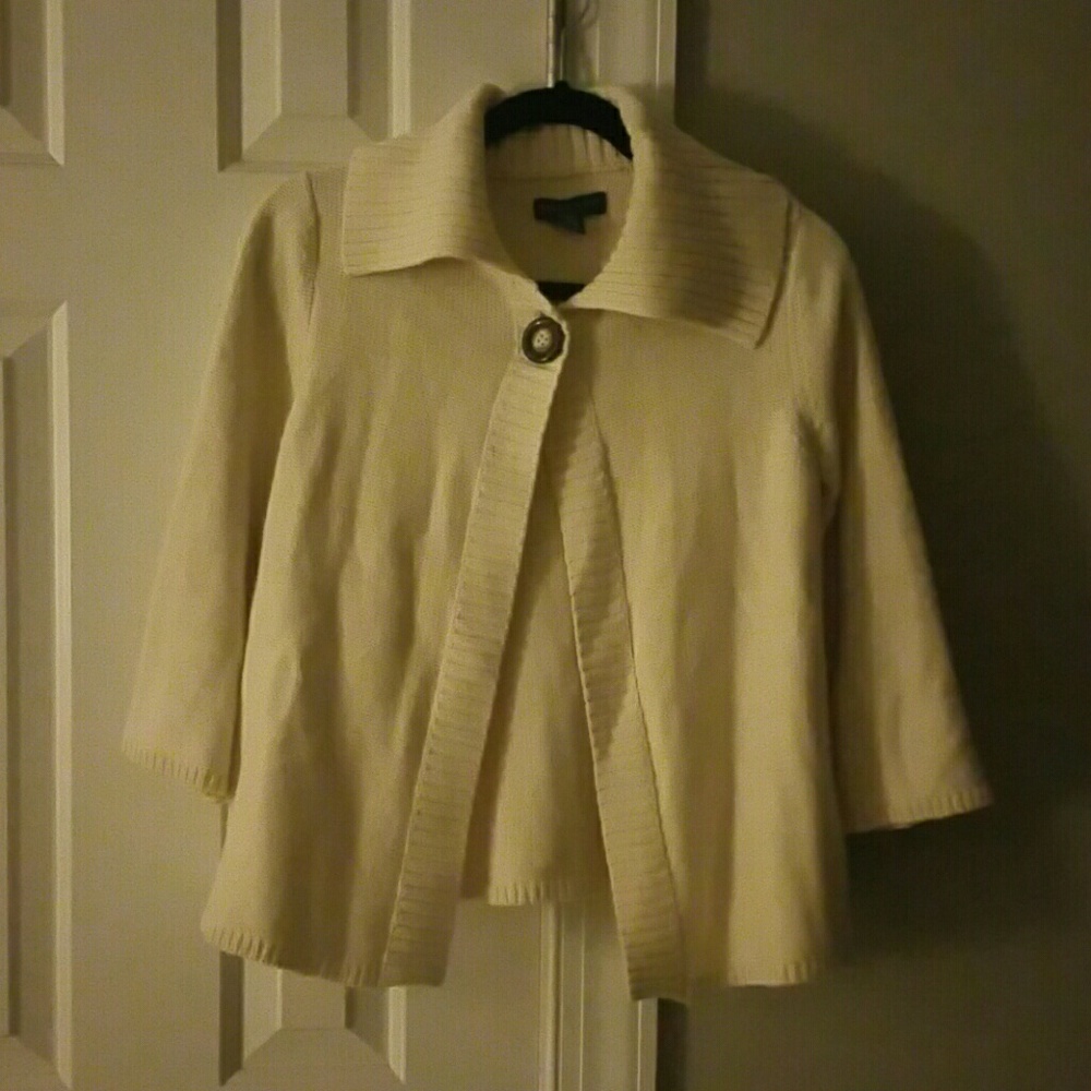 Cardigan, cream colored.