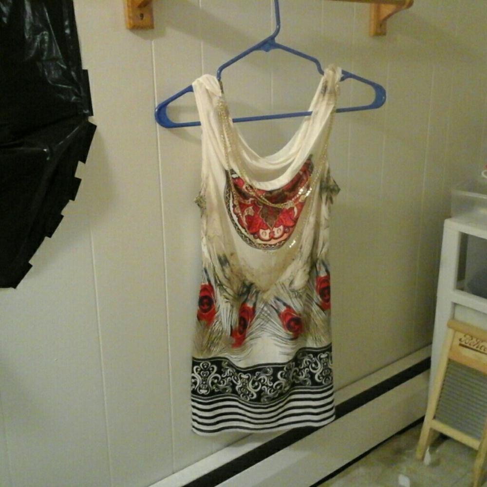 A beautiful sexy dress  size M/L never worn (new)